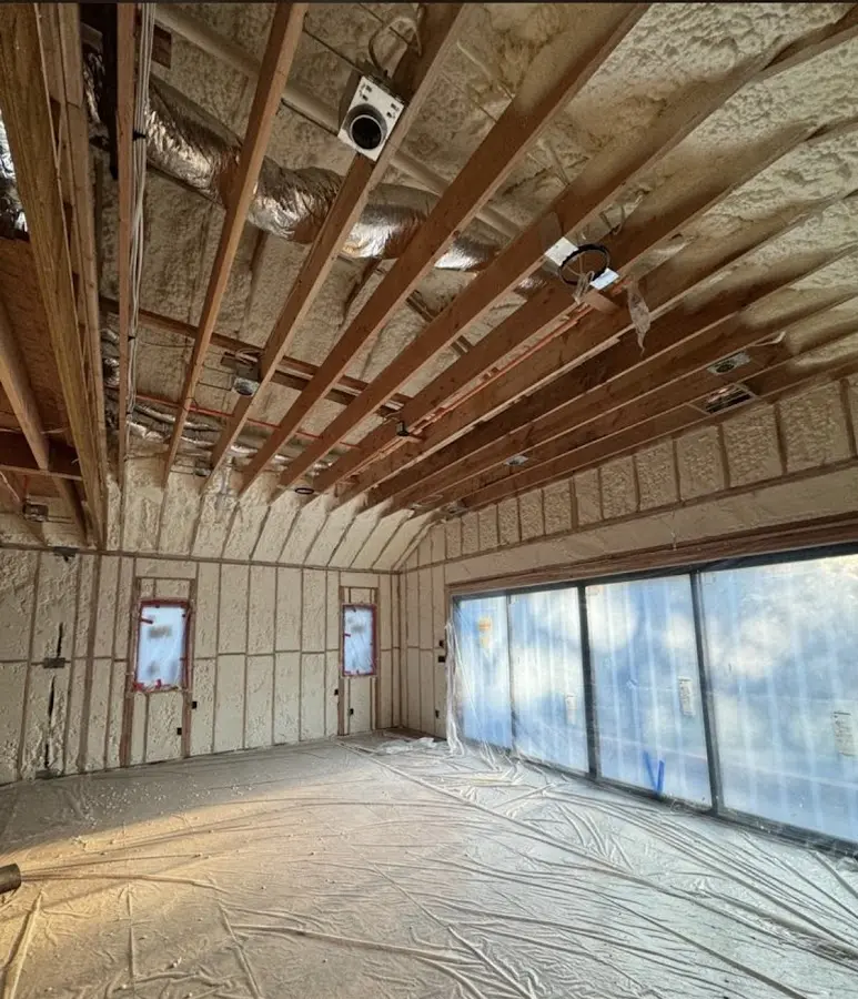 Interior walls and ceiling insulated with spray foam during new construction in Sapulpa